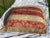 A unusual shape a square right ? For some reason this one seems a perfect one for some reason. Nica red Florentine scroll...