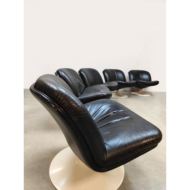 What a catch! This complete set of 5 unique vintage design swivel chairs/lounge armchairs is rarely found. Designed by...