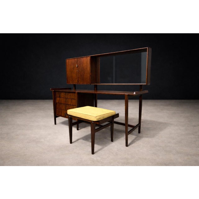 Designed in the 1950s by Carlo Hauner for Forma, this dresser and stool form part of a rare and cohesive Brazilian Modern...