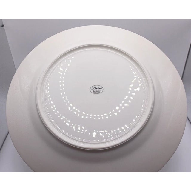 Lovely vintage pie plate and matching pie server by Andrea by Sadek, featuring a delicate floral design with soft, classic...