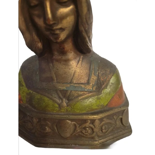 A wonderful pair of Vintage bronze bookends featuring Dante & Beatrice Pompeian. The bookends were cast molds with bronze...