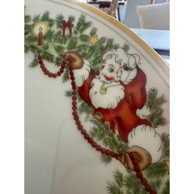 Christmas dinnerware created by Fitz and Floyd is a marvelous way to celebrate the holidays. Service for fourteen with 5...