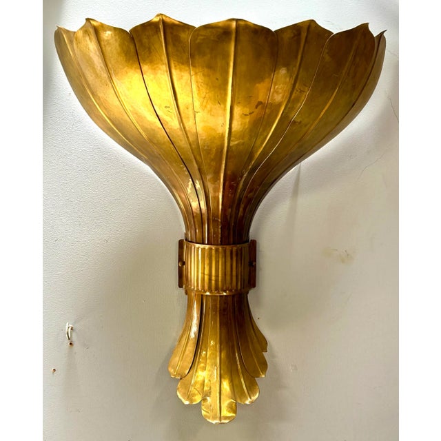 These beautiful sconces are by Herman Grag Designs, handmade formed brass and make a real statement in a room! They are...