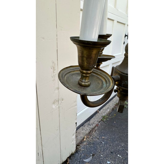 Old Lights On is pleased to offer this vintage brass four arm hanging fixture. It is wired and ready to install. We ship...
