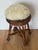 1950 th handmade wicker stool with lamb skin fur pillow.