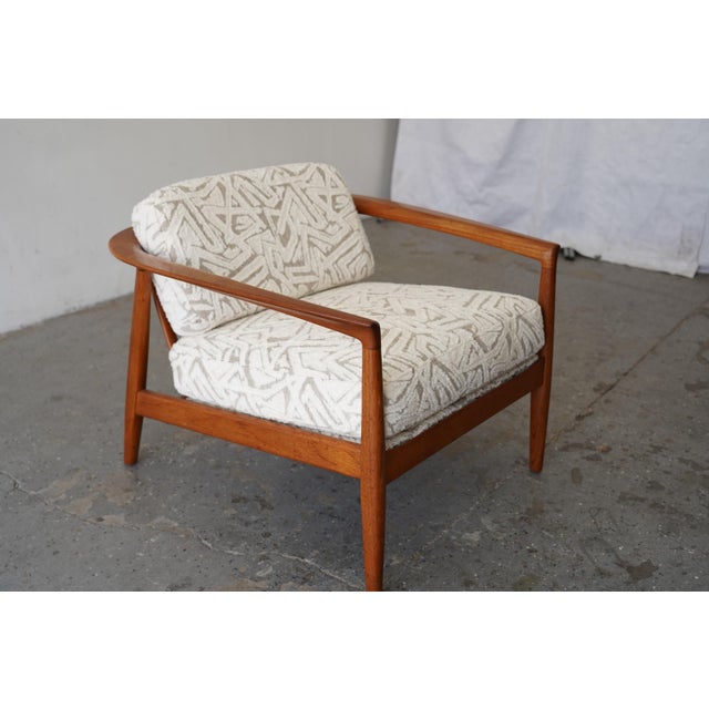 Folke Ohlsson Danish Modern Walnut Lounge Chair for DUX Model 72-C A beautifully refined example of Scandinavian design,...