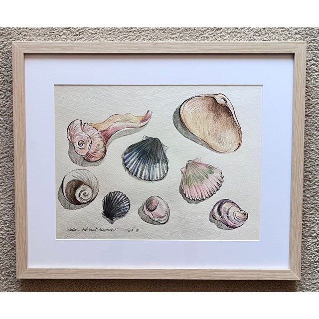 This pair of limited edition prints of original watercolors painted on Nantucket in 1991 feature custom natural wood...