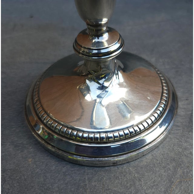 Pair of Weighted Sterling Silver Convertible Three-Light Cadelabra. Base is 4" in diameter. 10" in width, 8.5" in height...