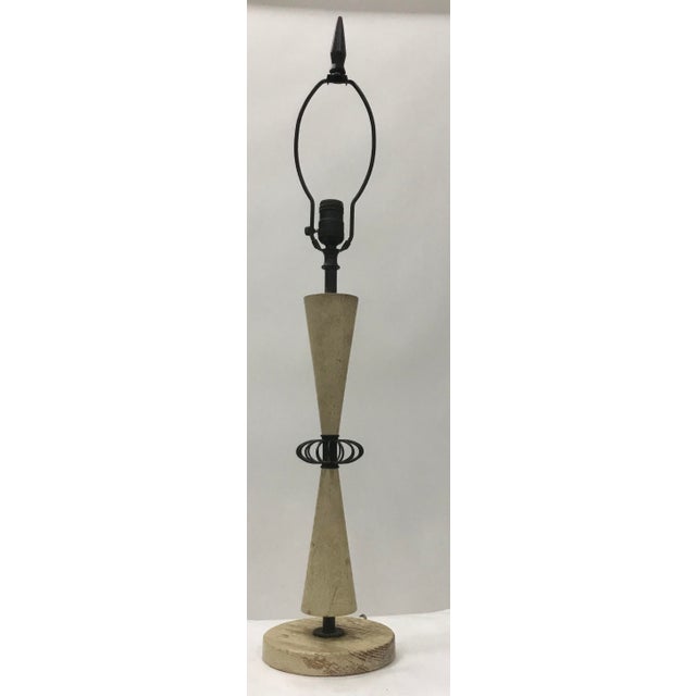 Fun mid-century painted wood and metal lamp . Off-white painted oak base and body with black metal accents . Weighted base...