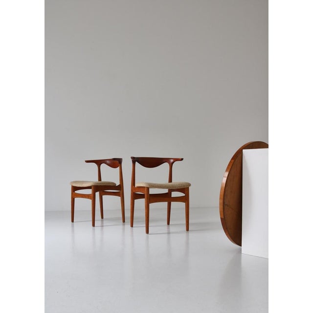 Rare pair of Model 251 "Cowhorn" armchairs by Danish designer Knud Færch made at Slagelse Møbelværk in the early 1960s....