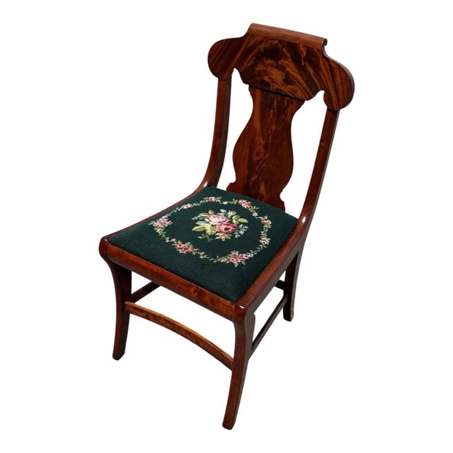 Beautiful 1940s Mahogany Empire side chair featuring its original floral needlepoint upholstery. Professionally sanded and...