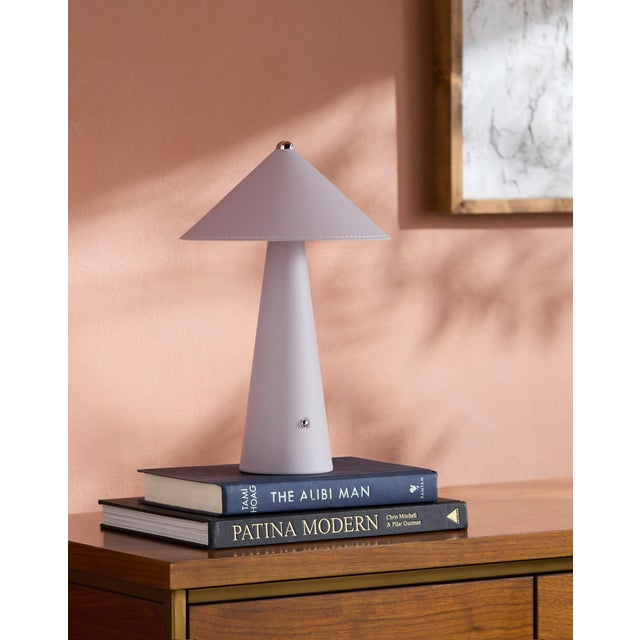Illuminate your space with a touch of retro flair with the Nomelle accent table lamp. Standing at a charming 12 inches...