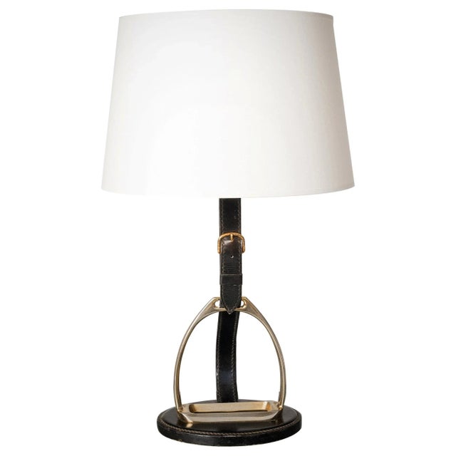 Elegant neoclassical black stitched leather and brass horseshoe shaped base table or desk lamp. In good vintage condition....