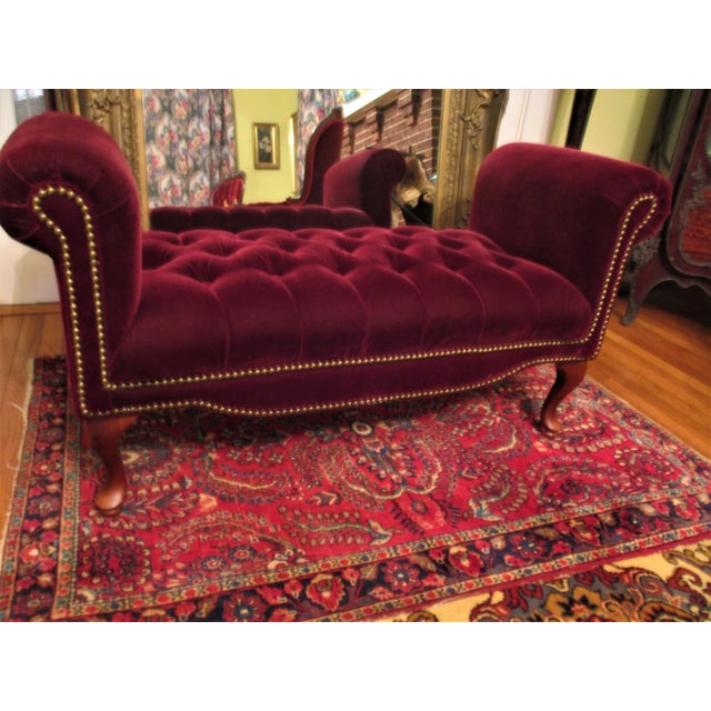 This is a Vintage Queen Ann Style Red Velvet Tufted Ottoman Bench / Entryway Couch Settee with Tall Rolled Arms with Brass...