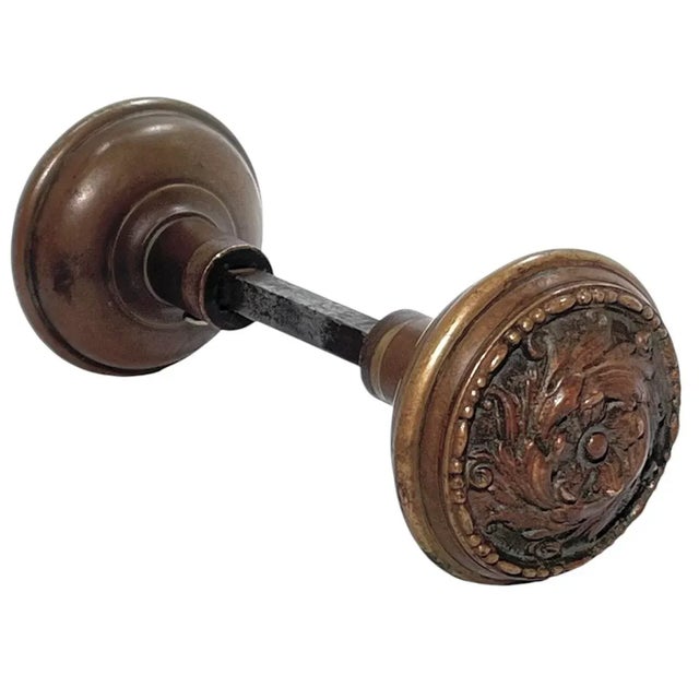 Add a finishing touch to your favorite door with this classical pair of American Romanesque bronze door knobs manufactured...
