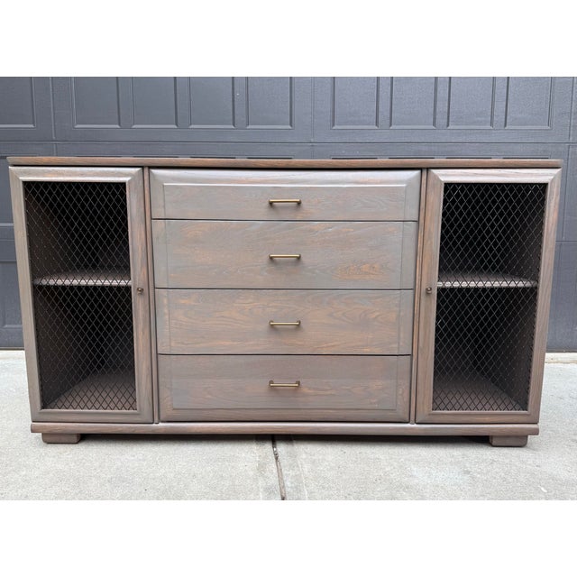 Bring timeless vintage craftsmanship into your home with this beautifully refinished Mengel credenza. Featuring a warm...