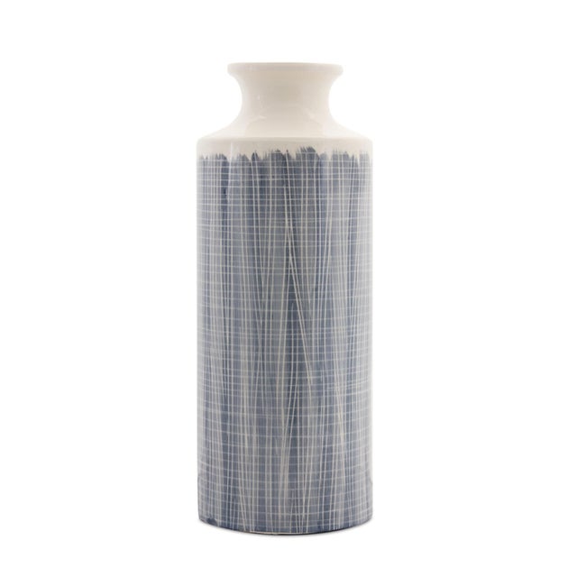 Add a touch of sophistication to your space with this stunning Terra Cotta Floor Vase. Featuring a beautiful blue and...