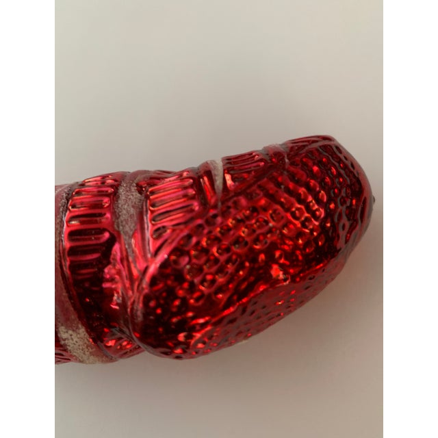 Vintage German blown glass Christmas ornament in shape of Stocking with blue bow. 6” tall. From a Collector of Christmas...