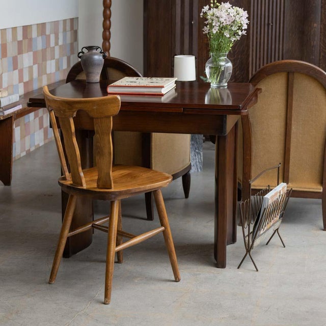 Beautiful wood mountain chair from France, 1950s. Brutalist style with carved wood back with three wide slates. Formed...