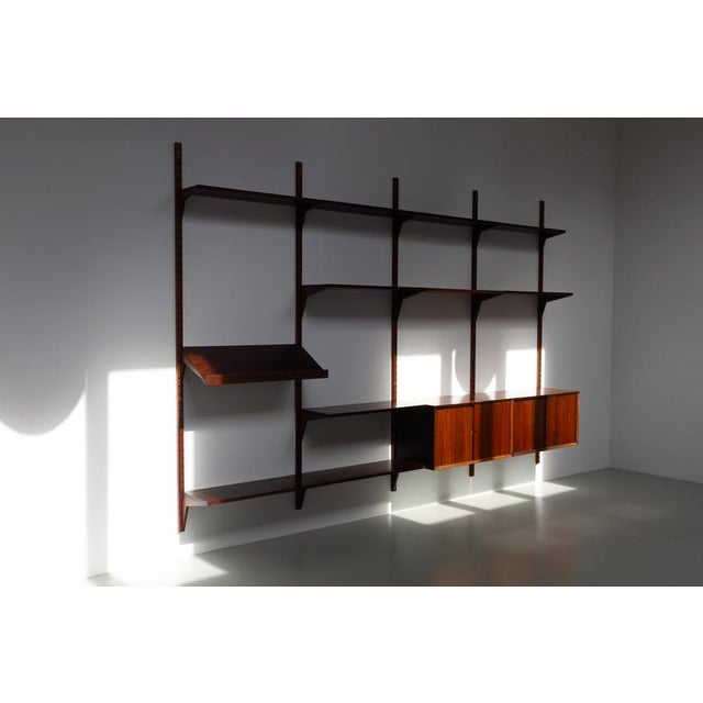Vintage Danish Rosewood Modular Wall Unit by Poul Cadovius for Cado, 1960s. Scandinavian Mid-Century Modern 4 bay shelving...