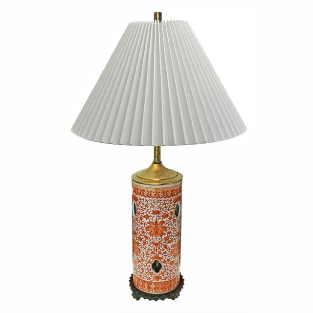 Chinese porcelain hat stand with pierced quatrefoil ventilation. The vibrant iron-red enamels are set against a white...