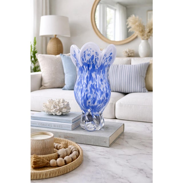 Striking handblown art glass vase by Royal Gallery, crafted in Poland and dated 1999. This sculptural vase features an...