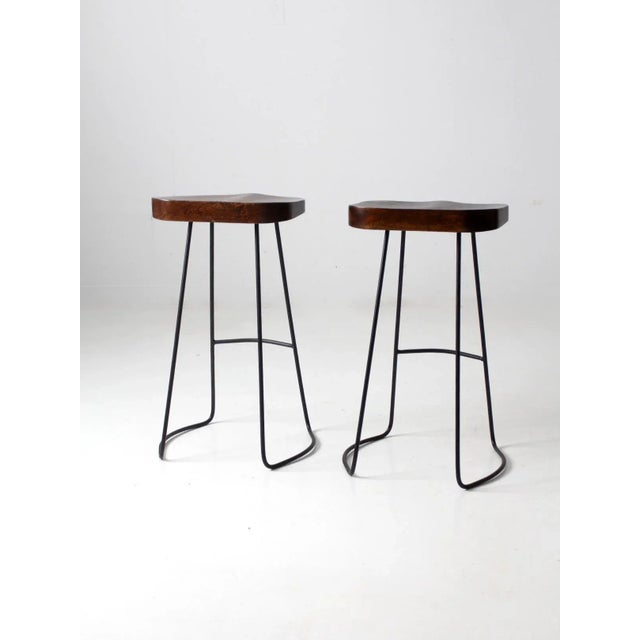 Pair of Vintage Sculpted Wood Saddle Seat Bar Stools With Black Iron Bases For Sale - Image 9 of 11