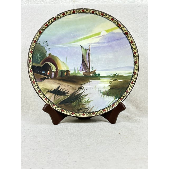 Vintage hand painted Nippon plate and stand. This is a pre-owned item so please see all pictures and ask any questions.