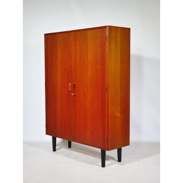 Børge Mogensen highboard for Søborg Møbelfabrik, Denmark, 1960s. Made of teak with a simple front design, integrated...