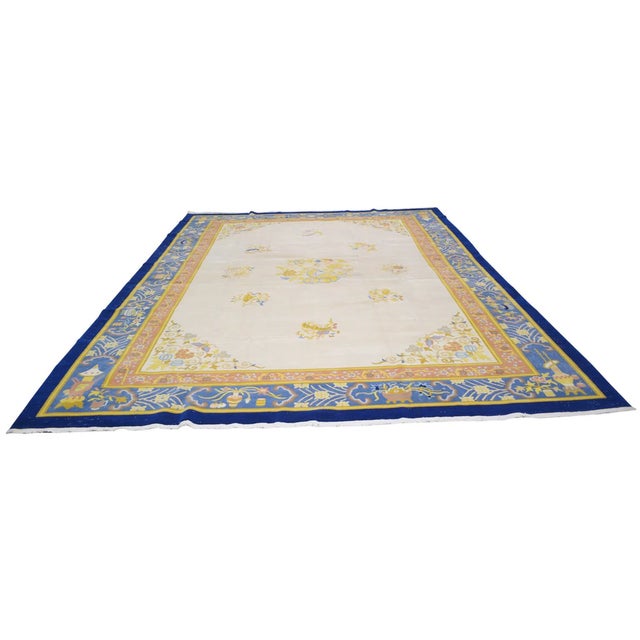 Hand-knotted with care using traditional rug-making techniques, this wool rug blends timeless craftsmanship with a modern...