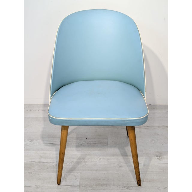Blue Retro Cocktail Armchair from the 1950s Stylish retro armchair from the 1950s. Upholstered in elegant blue vinyl...