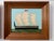 This coordinating set of seascapes pairs robin's egg blue skies with avocado green foregrounds and black vessels, softened...