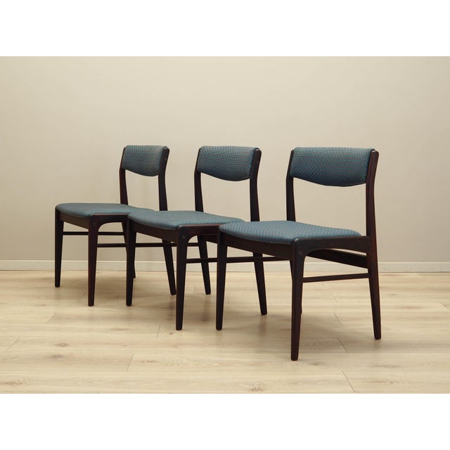 The set of three chairs made in the 1970s, Danish production. The frame is made of rosewood. The wood has been refreshed....