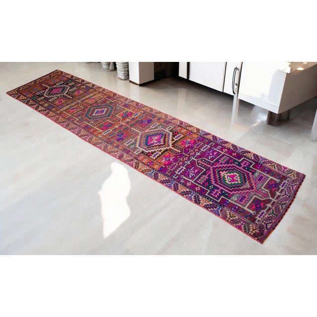 Offered is a gorgeous Kurdish runner rug, made in Anatolia approximately 50-60 years ago. The beautiful wool on wool pile...