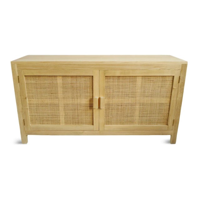 Beautiful vintage raw teak and rattan sideboard cabinet. Fixed shelves with 10.5" space between. Beautiful for a bedroom...