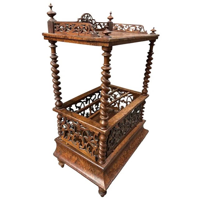 Elegant antique Victorian Canterbury-style walnut stand featuring richly figured burl veneer surfaces, beautifully turned...