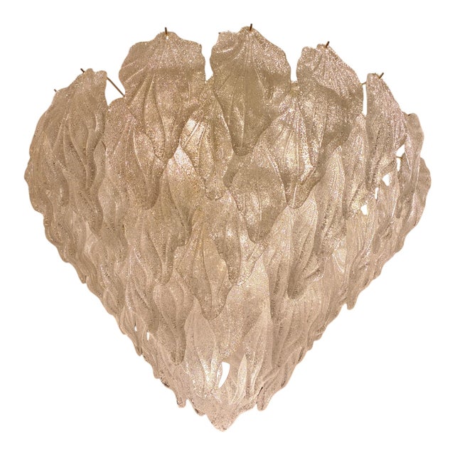 Waterfall lamp with overlapping leaf-shaped pieces, made of Murano glass. Up to 250V (Europe/UK Standard).The wiring of...