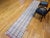 Vintage American Rag Runner, a beautifully handwoven textile that blends traditional craftsmanship with a clean, modern...