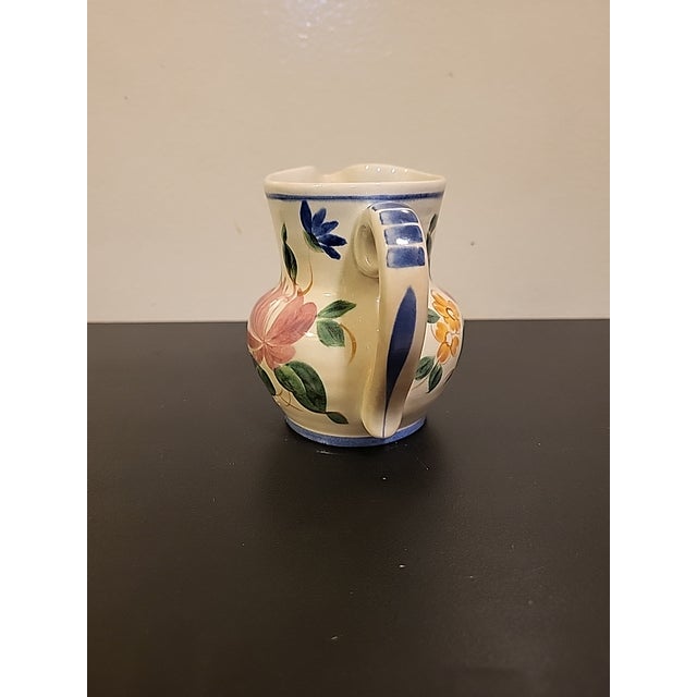 Beautiful botanical creamer manufactured by Redwing USA. The "Orleans" pattern was part of the "Gypsy Trail" line and...