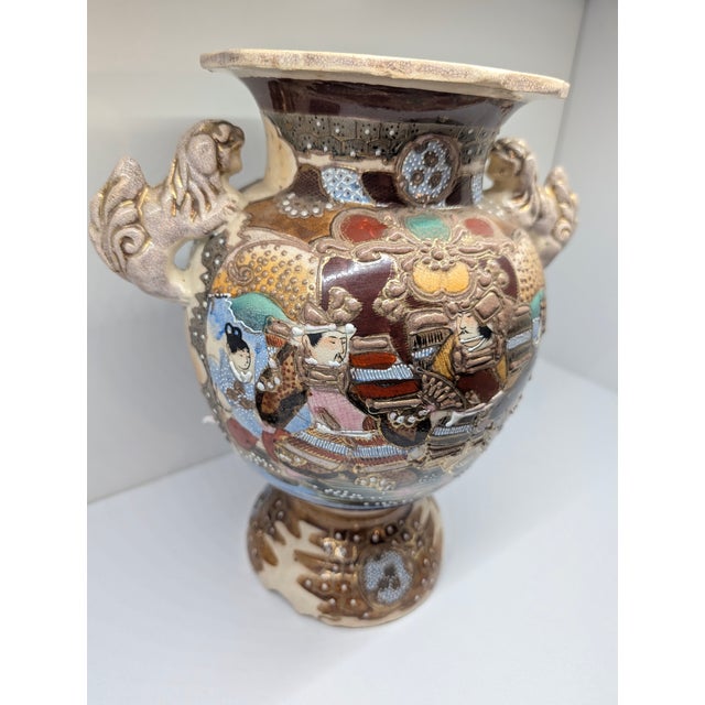 Mid‑Century Japanese Crackle Glazed Vase with Foo Dog Handles. Beautiful vintage Japanese vase featuring figural scenes in...