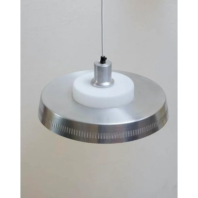 Danish vintage lamp, aluminum plate with a glass shade inside. Light source – bulb, E27 thread. Good condition due to the...