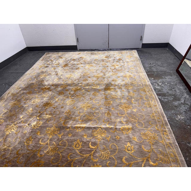 Design Plus Gallery presents a Floral Vine Pattern Wool + Silk Area Rug. This rectangular rug showcases an intricate...