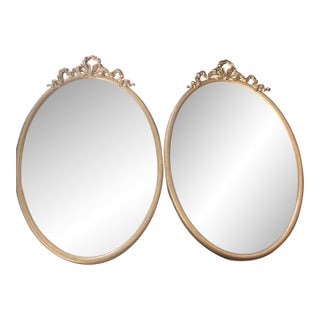 Early 20th Century Oval Large Cast Brass Frames With Heavy Metal Ribbon Trim at Top- A Pair For Sale