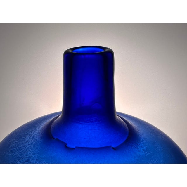 This high-quality studio glass art vase was designed by the renown glass artist Bertil Vallien (born 1938). An impressive...