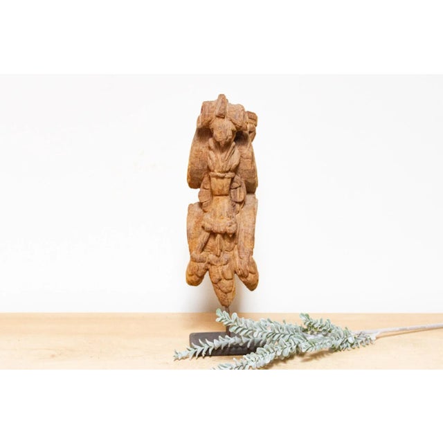 Enchanting 18th-century Indian corbel, a rare architectural gem adorned with a meticulously carved peacock. This terrific...