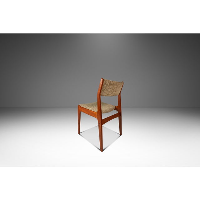 This refined Danish Mid-Century Modern dining or desk chair by Scandinavia Woodworks Co. exemplifies the minimalist...