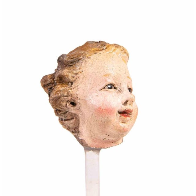 Head of child is a sculpture realized in polychrome ceramic with glass eyes. Neaples, 18th Century.