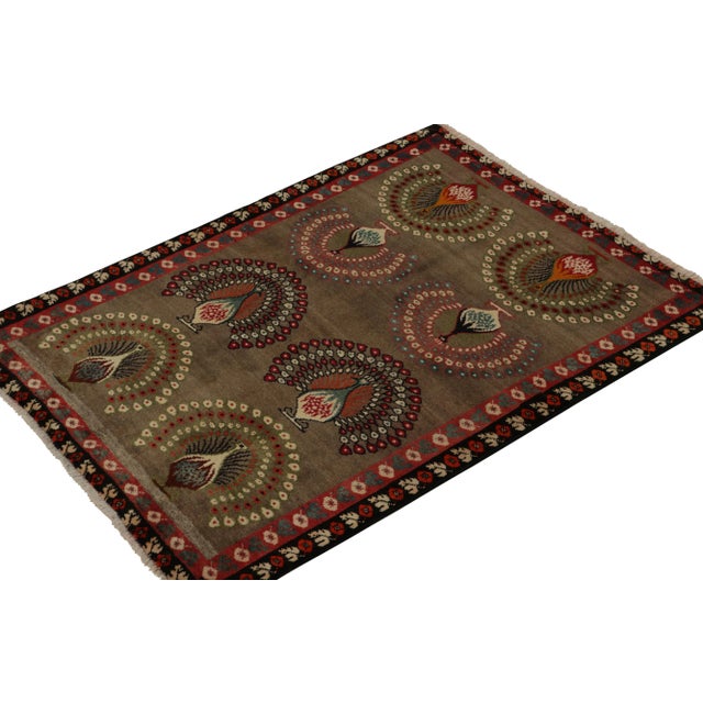 This vintage 4x5 Gabbeh Persian rug is from the latest entries in Rug & Kilim’s rare tribal curations. Hand-knotted in...