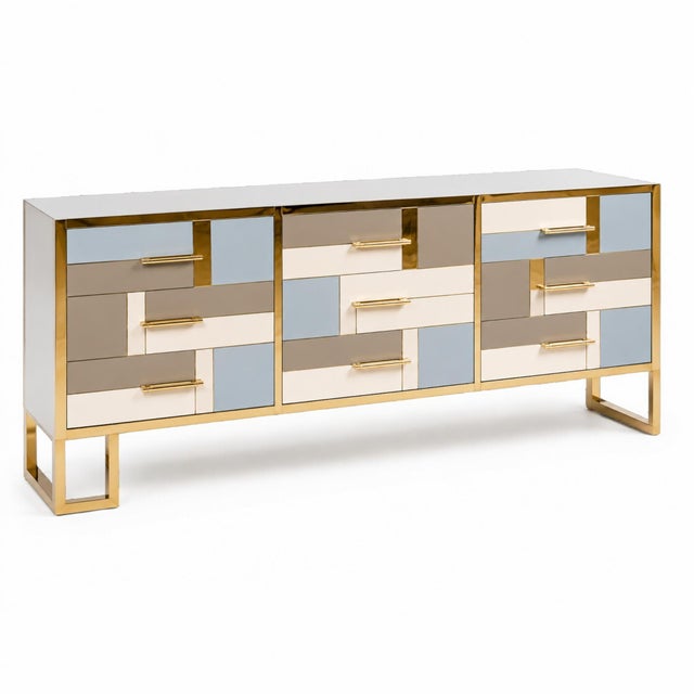 Italian Mid-Century Modern 9-Drawer Sideboard with Inlaid Glass and Brass This bespoke Italian sideboard is a striking...
