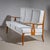 Set consisting of a three-seater sofa and two matching armchairs, featuring elegantly curved armrests and finely crafted...